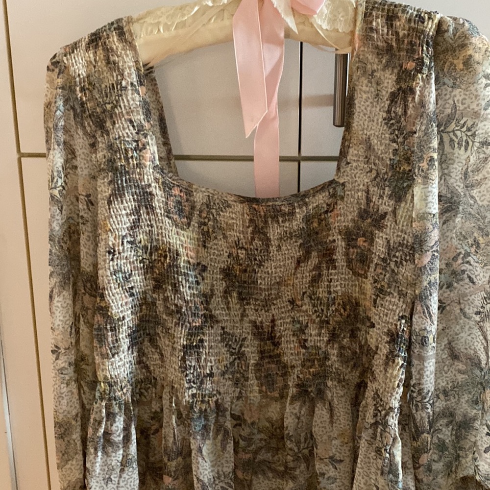 Free People ivory/pink/grey print shirred elastic peasant top.  Waist length.